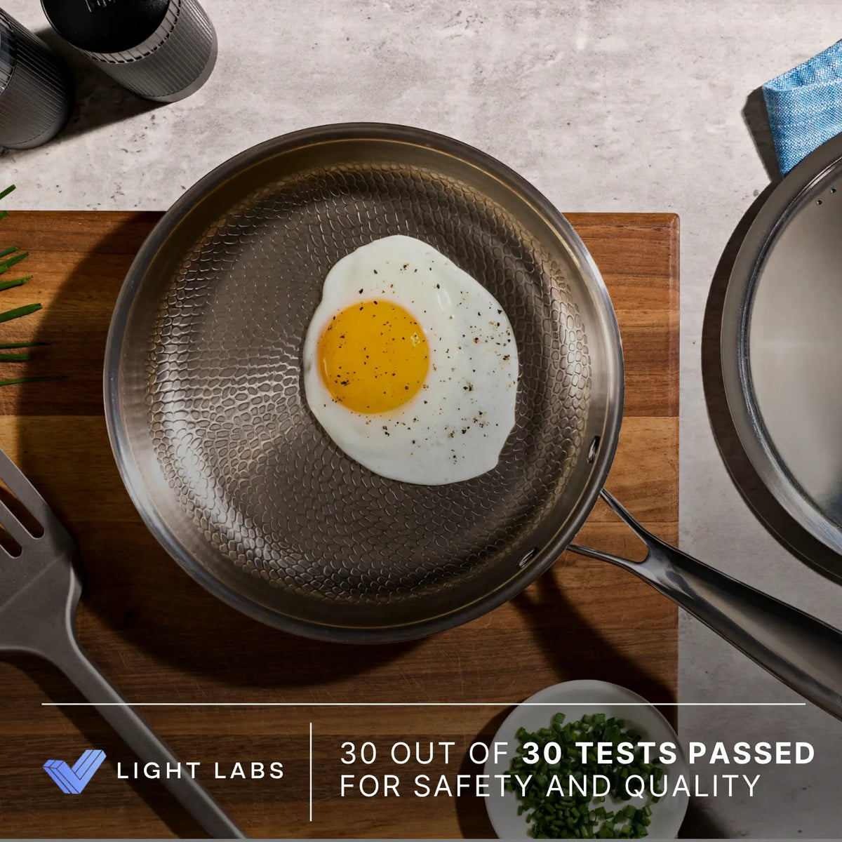 Fried egg in a Siraat Titanium Hammered Pan Pro Large, Light Labs tested with 30 of 30 tests passed