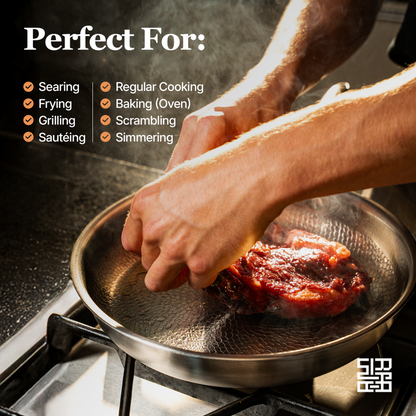 Seasoning steak in a Siraat Titanium Hammered Pan Pro Large, perfect for searing, frying and baking