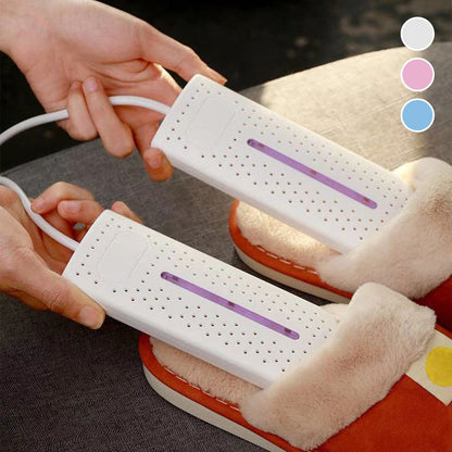 Portable shoe dryer being inserted into footwear